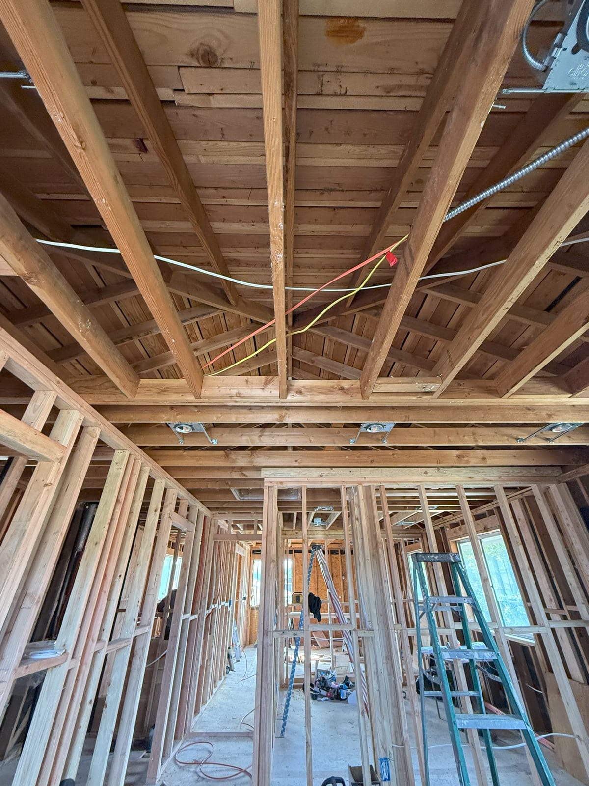 Down to the studs. The interior was taken all the way back to framing, ceilings included, before anything went back in.